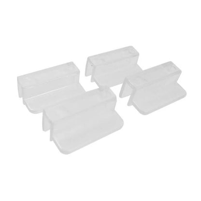 Four translucent white plastic clips or fasteners arranged on a plain white background.