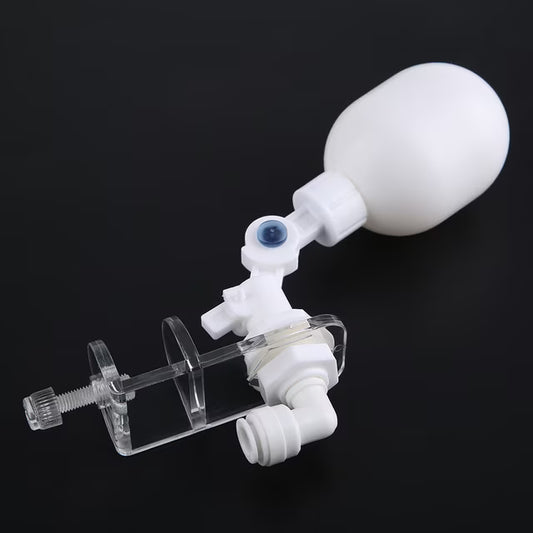 White medical device with a bulb on a black background