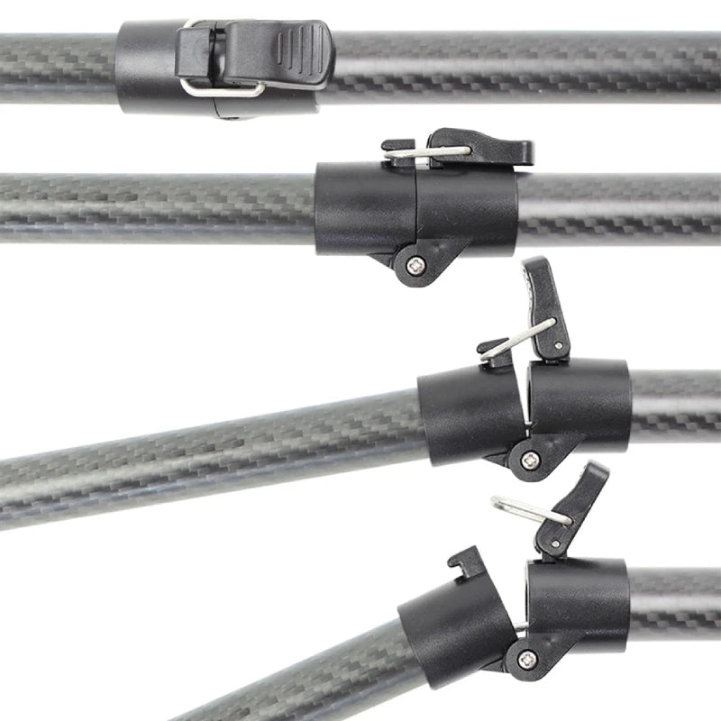 Close-up of several black quick-release clamp fittings attached to a dark carbon-fiber rod, arranged diagonally on a white background.