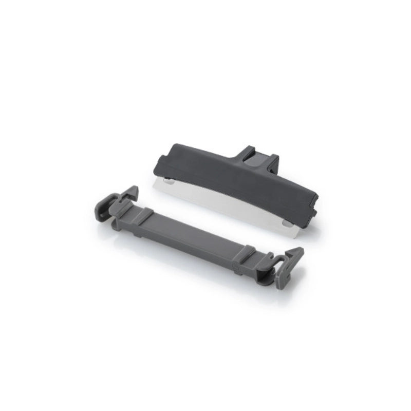 Two dark gray plastic replacement parts, blade for algae scraper
